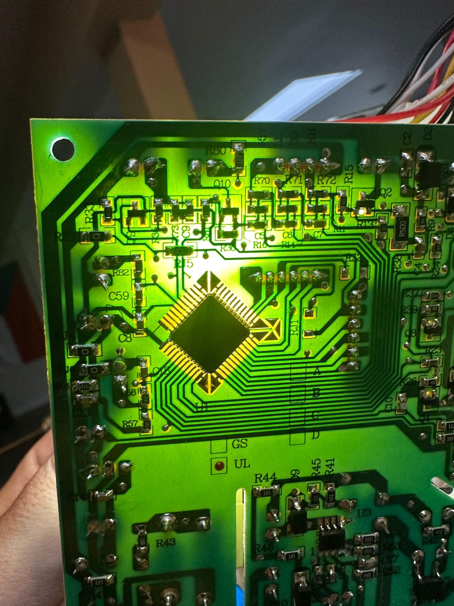 Close-up of an appliance control board, the electronic brain behind your oven's functions
